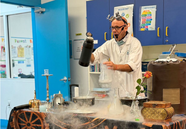An instructor conducting a hands on science and invention prototyping experiment for the Innovators Lab summer camp at Brickell International Academy in Miami